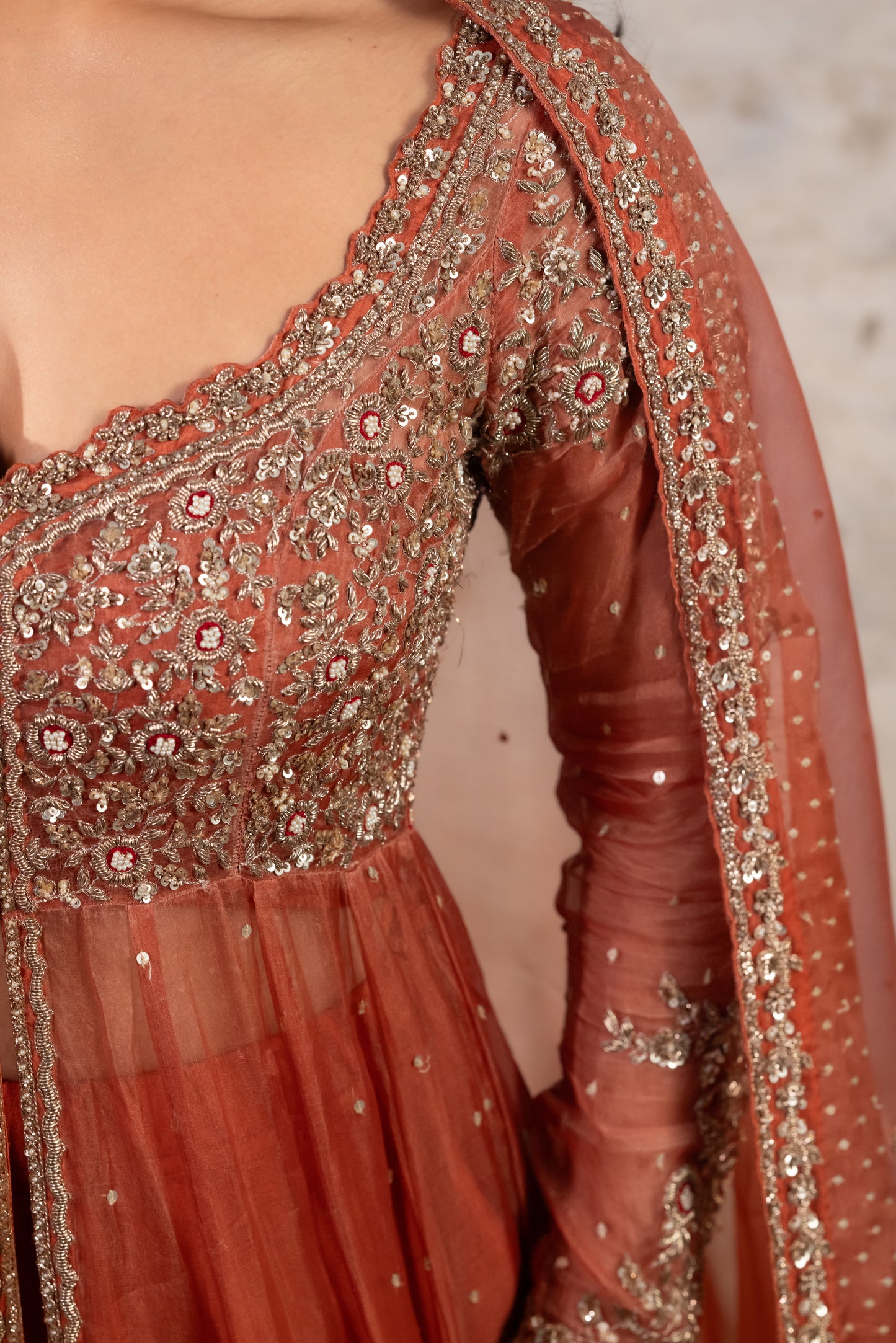 RUST CAPE WITH BUSTIER, SKIRT & DUPATTA