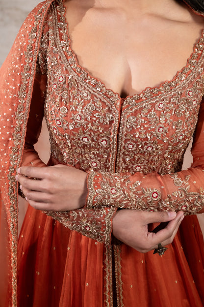 RUST CAPE WITH BUSTIER, SKIRT & DUPATTA